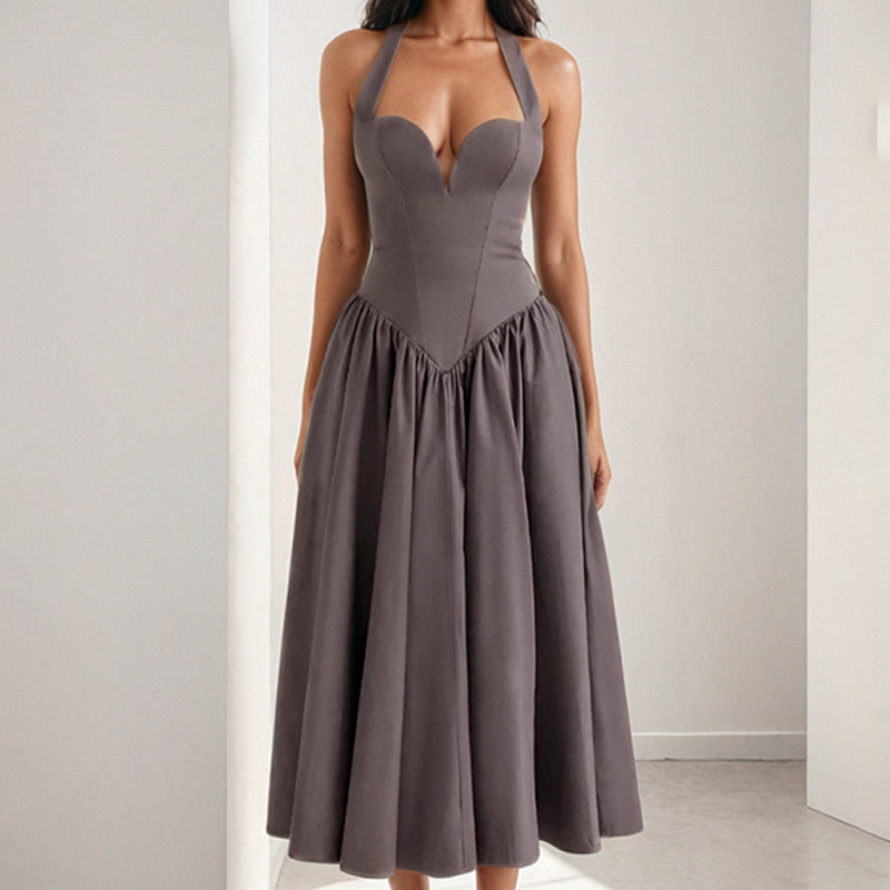 Halter neck backless maxi dress with a flared skirt